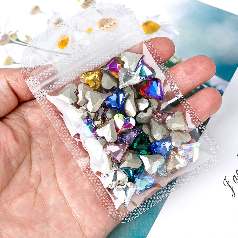 White crystal glass diamond coatings with ecstasy valent cell phone casings.