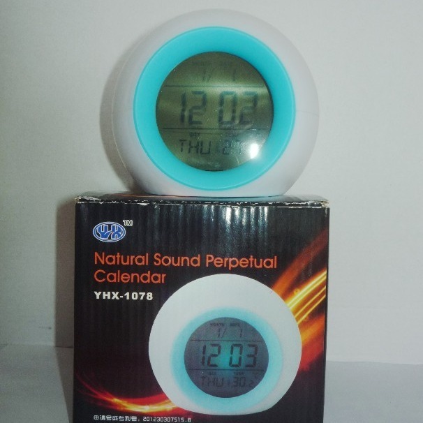 It's a spherical clock with a natural alarm clock.