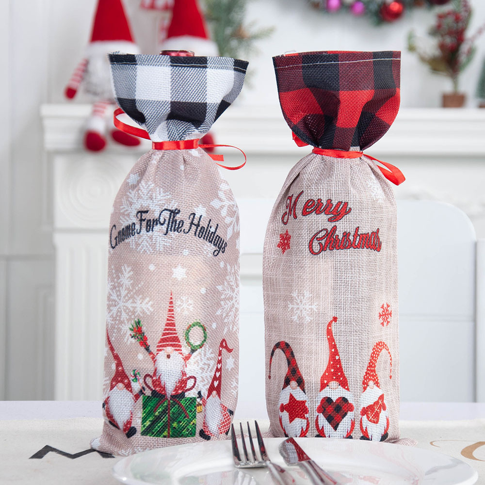 A Christmas bottle with a margarita bottle with a cute faceless old man bottle with a champagne bag table.