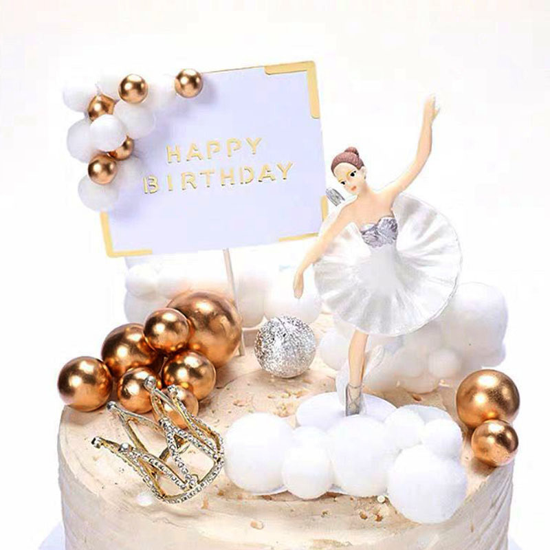 A small square twilight ball, a gold ball, a rich, rich, beautiful birthday cake decorated sticker.