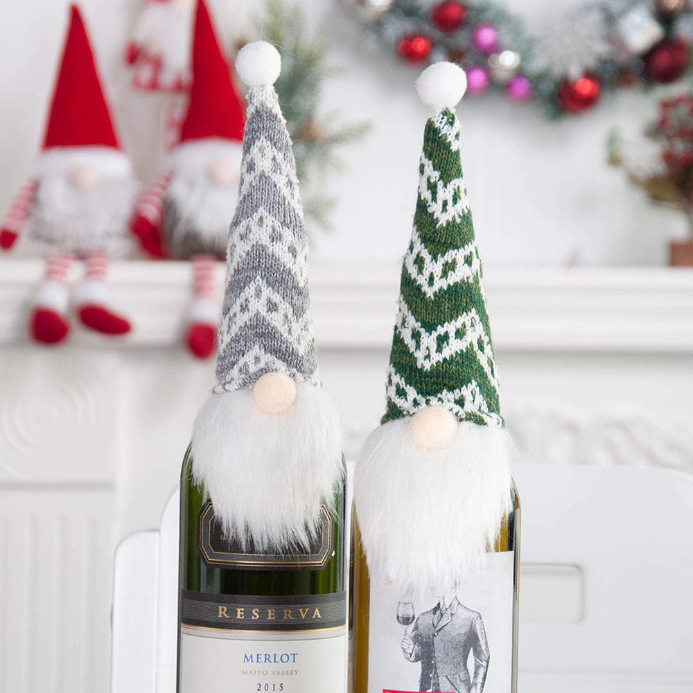 A Christmas bottle with a faceless, moustache-bore-bossed, decorated and creative Christmas wine cap.