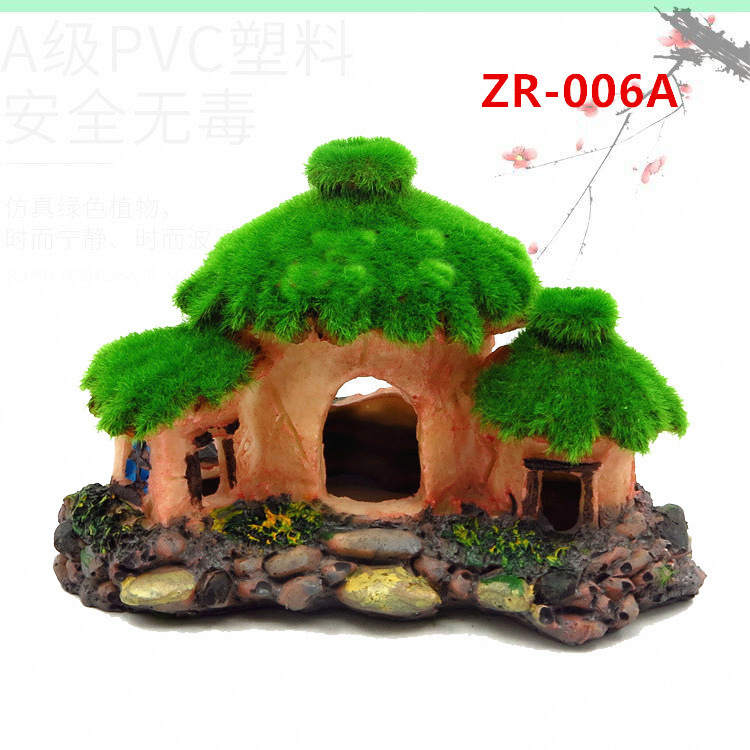 Các thủy cung nhựa nhìn vào bể cá và trang trí những vịnh tôm và bình hoa để trốn trong nhà. Cái lỗ nhỏ trên cây.