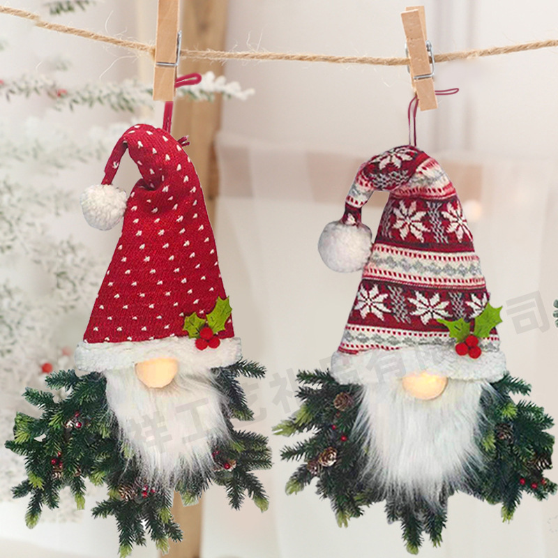 Christmas decorations glowing with faceless dolls knitting hairlines.