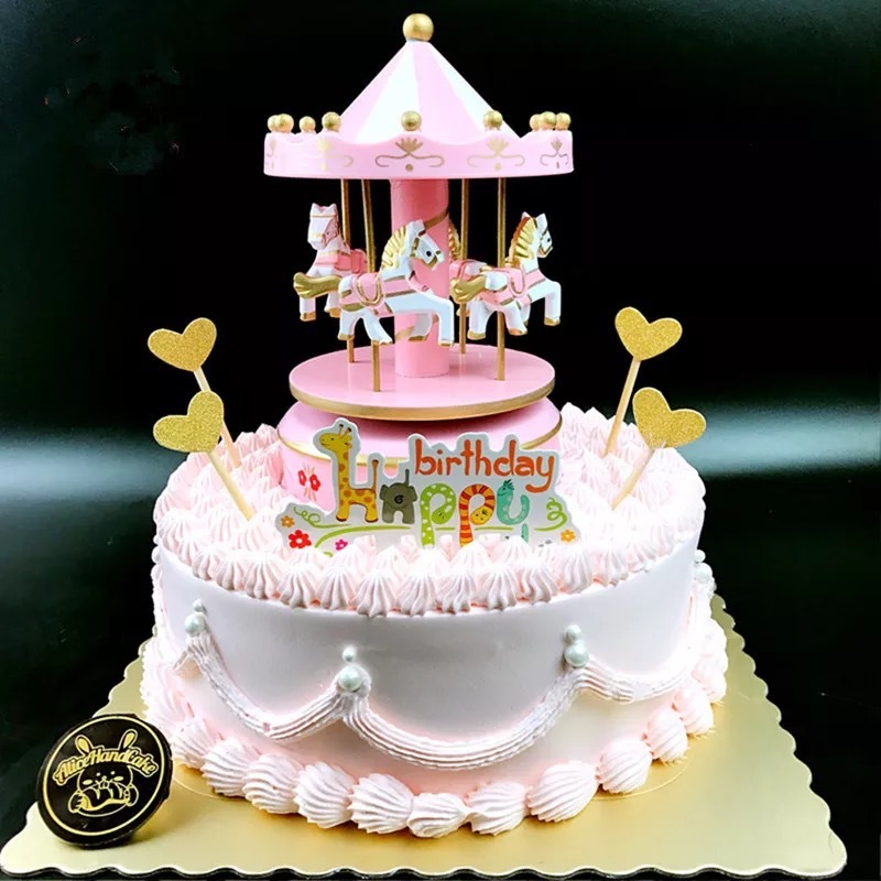 A carousel box cake to decorate the idea of a carousel birthday wedding costume.