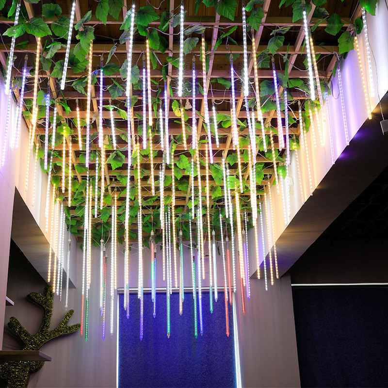 LED showers distributed by the plant's 2023 Creative Tree Lantern Bar.