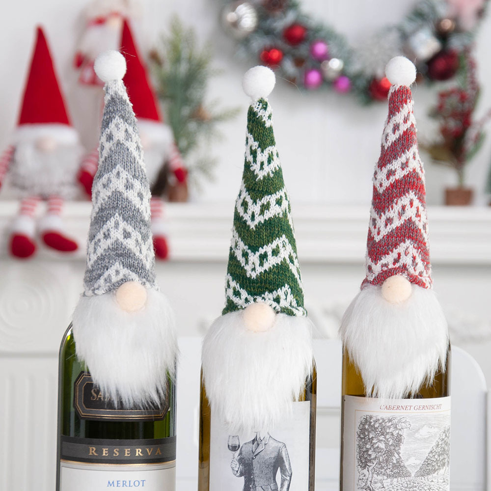 A Christmas bottle with a faceless, moustache-bore-bossed, decorated and creative Christmas wine cap.