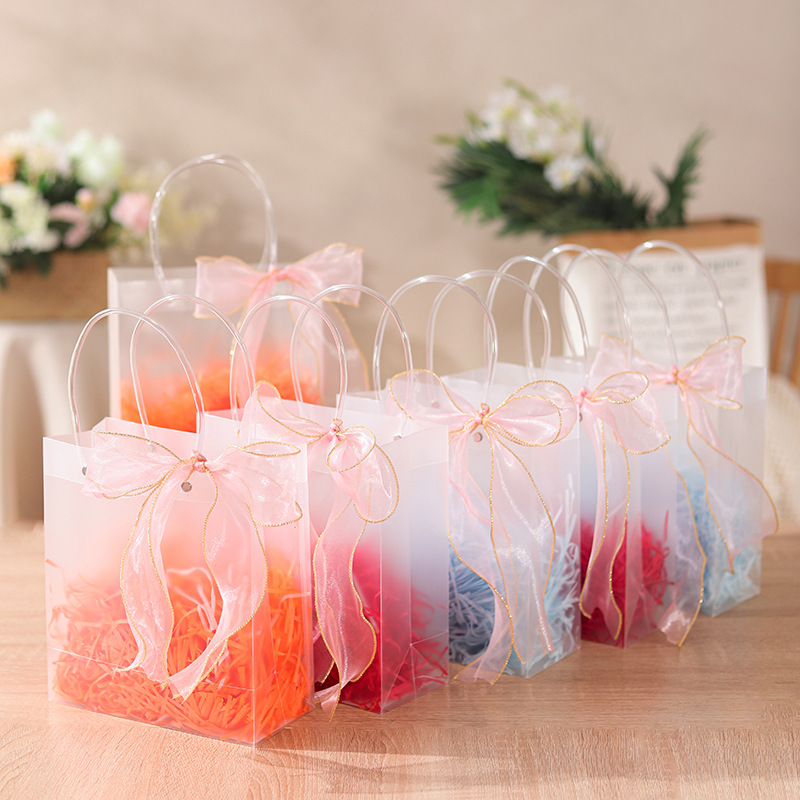 Wholesale of a gift box for the birthday of children in a plastic bag and handbag with transparency