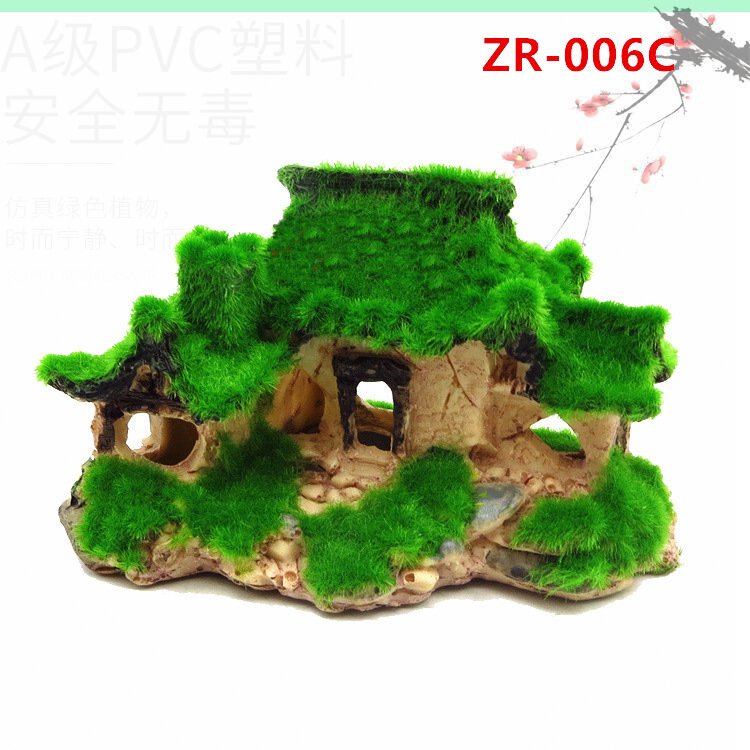 Các thủy cung nhựa nhìn vào bể cá và trang trí những vịnh tôm và bình hoa để trốn trong nhà. Cái lỗ nhỏ trên cây.