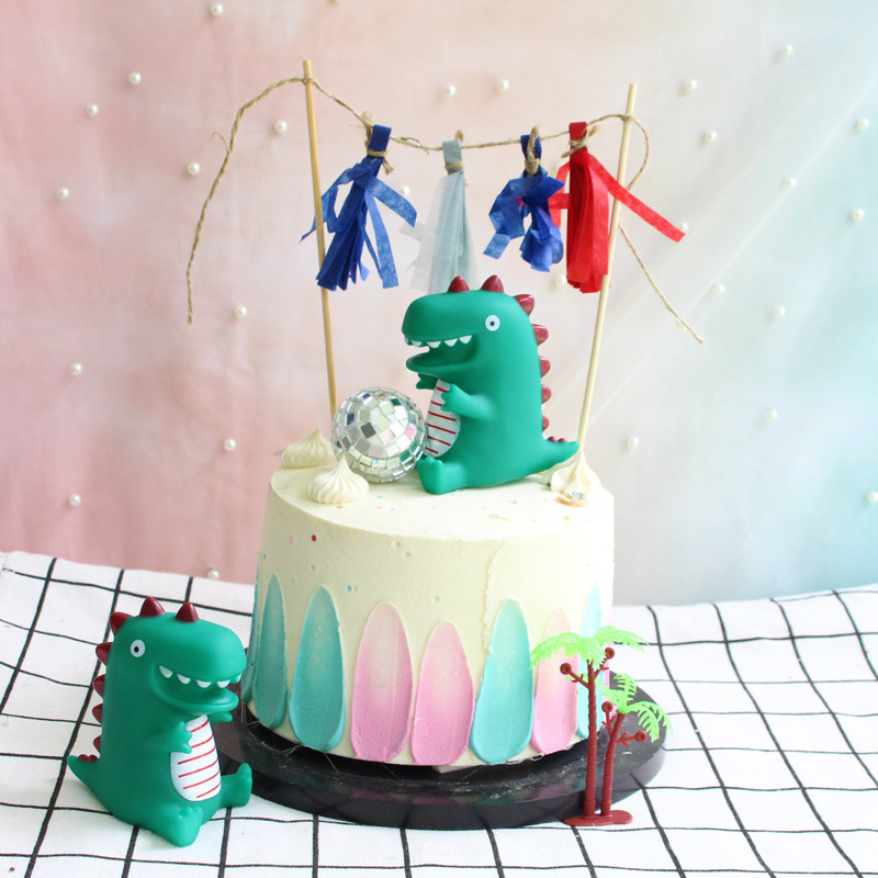 Dinosaurs cake decoration party for birthday theme dolls with dolls and toys.