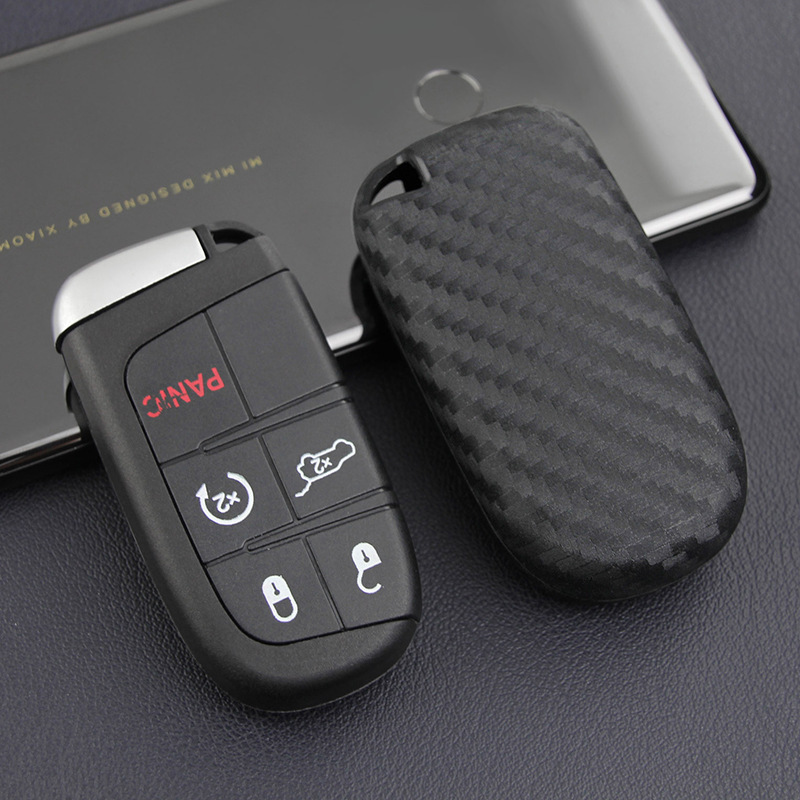 Wholesale of carbon-fibre-coated silicone key packs for Jeep Jeep Free Dodge Chrysler.