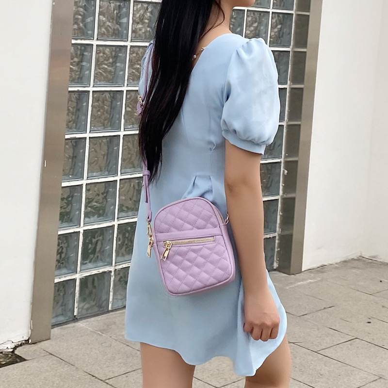 A 2023 new girl in a spot bag.