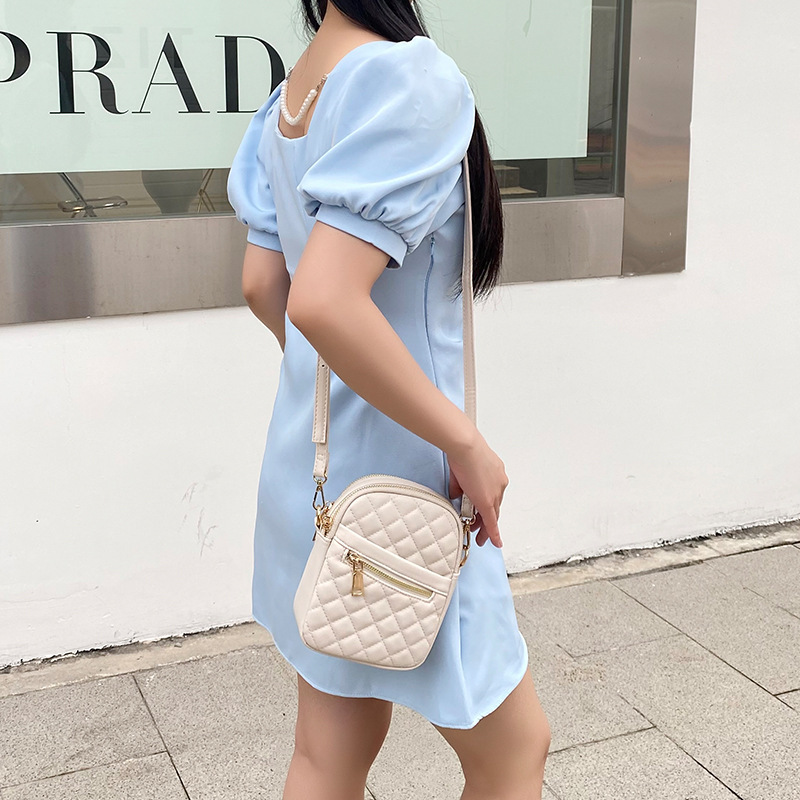 A 2023 new girl in a spot bag.