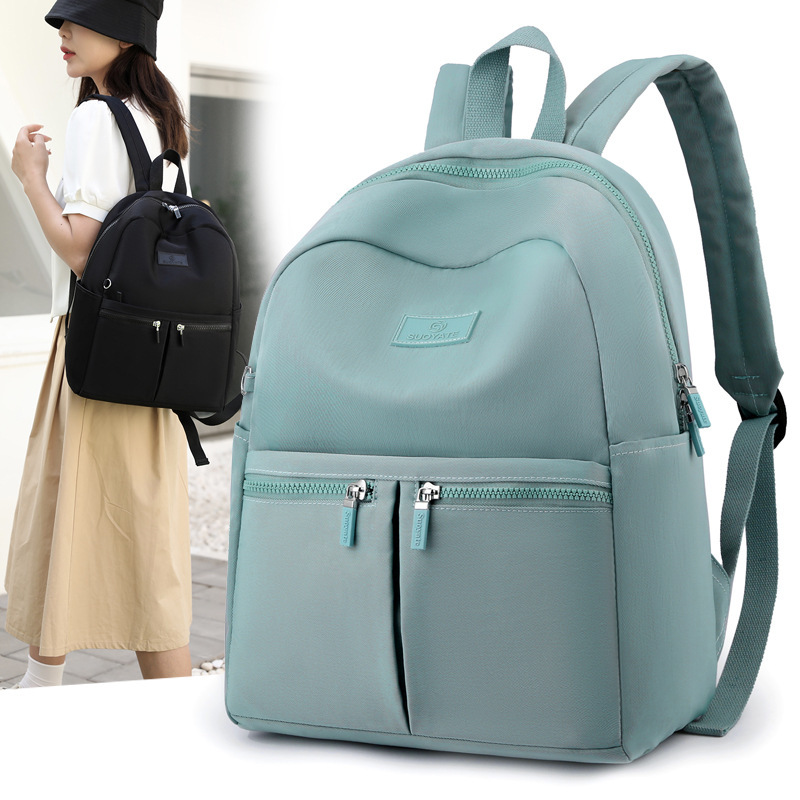 A 2023-tide-tweeted, light-skinned student bag, a waterproof nylon bag, and a commuting bag.