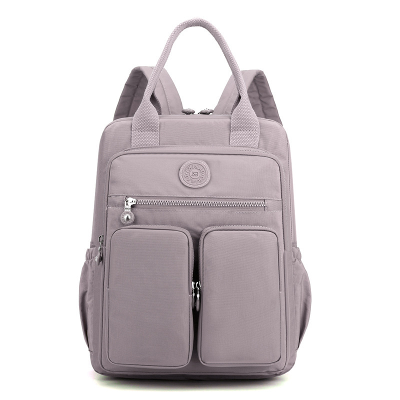 Cross-border thermal sale of double-shouldered, high-capacity student packs, squirming nylon buns, handbags.
