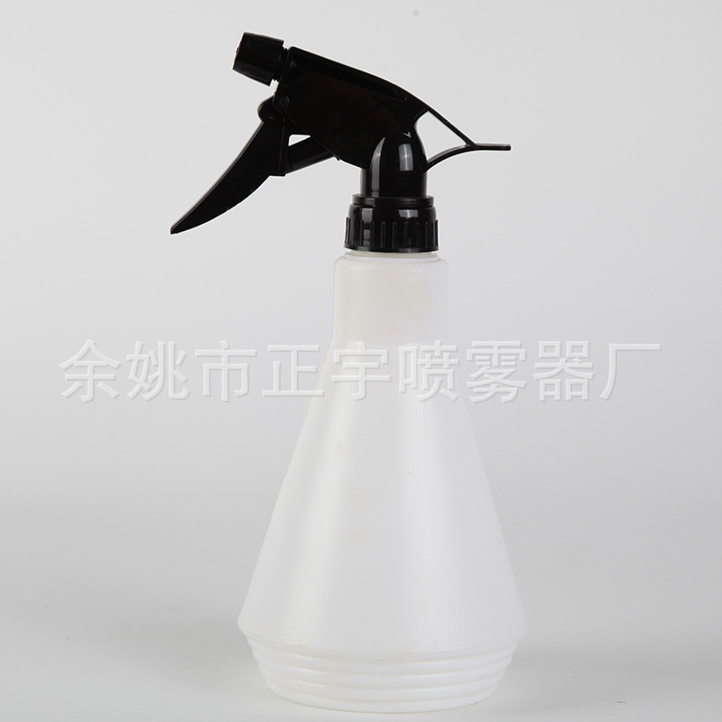 Một máy phun sương 300ml, một cái chậu vườn với một cái bình phun nước, một cái nút phun nước bằng tay.
