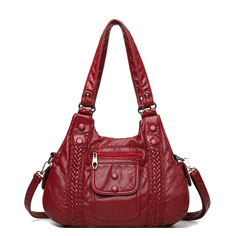 The new 2022 Korean version of the high-capacity water-washing middle-aged lady with a one-shoulder handbag and a free-slip bag across the border.