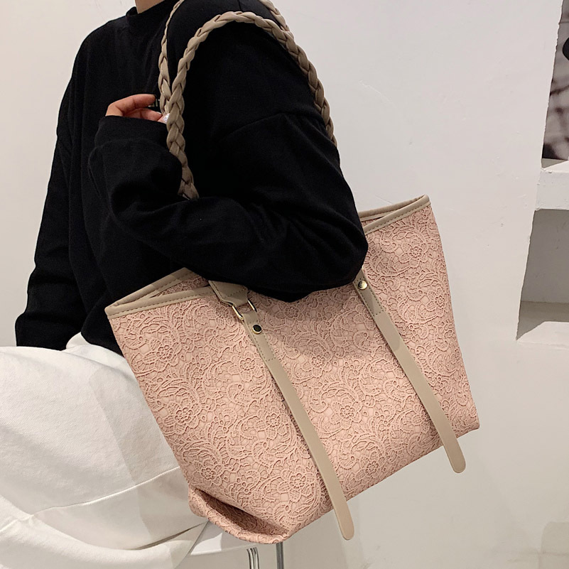 The big bag, 2021, is almost full of lace art.