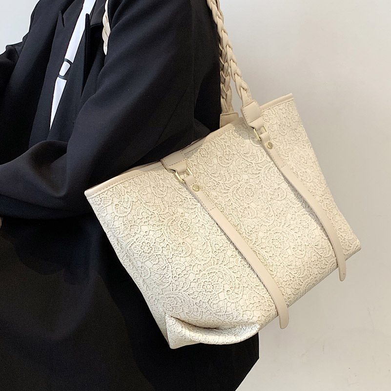 The big bag, 2021, is almost full of lace art.