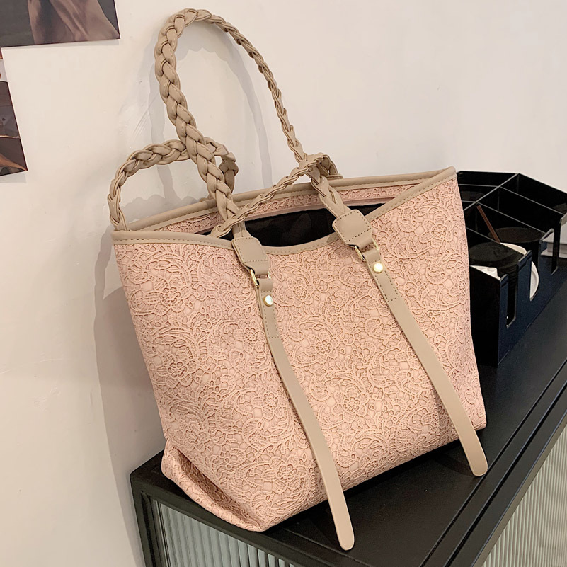 The big bag, 2021, is almost full of lace art.