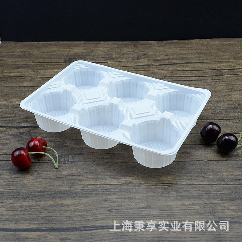 One-time plastic cups with milk and tea, coffee and food, plastic lining. Tray