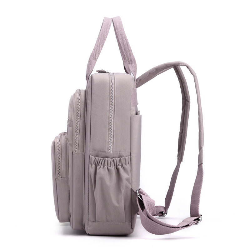 Cross-border thermal sale of double-shouldered, high-capacity student packs, squirming nylon buns, handbags.