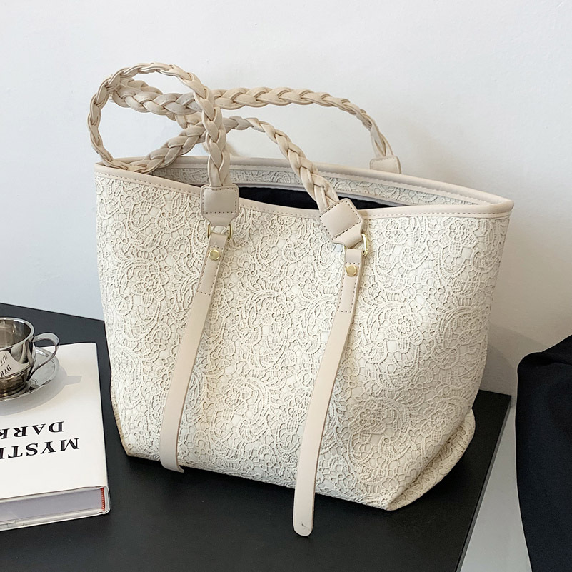 The big bag, 2021, is almost full of lace art.