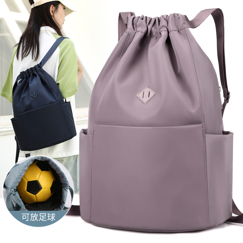 The new double-shoulder-packed leisure lady travel bag with light waterproof nylon packs of students' bags.