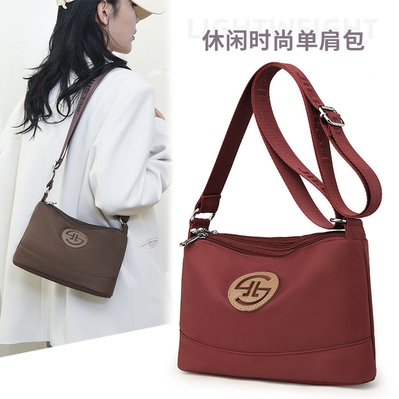 2024 JLS new size, single-shoulder-backed twirling lady, lightweight waterproof nylon bag.