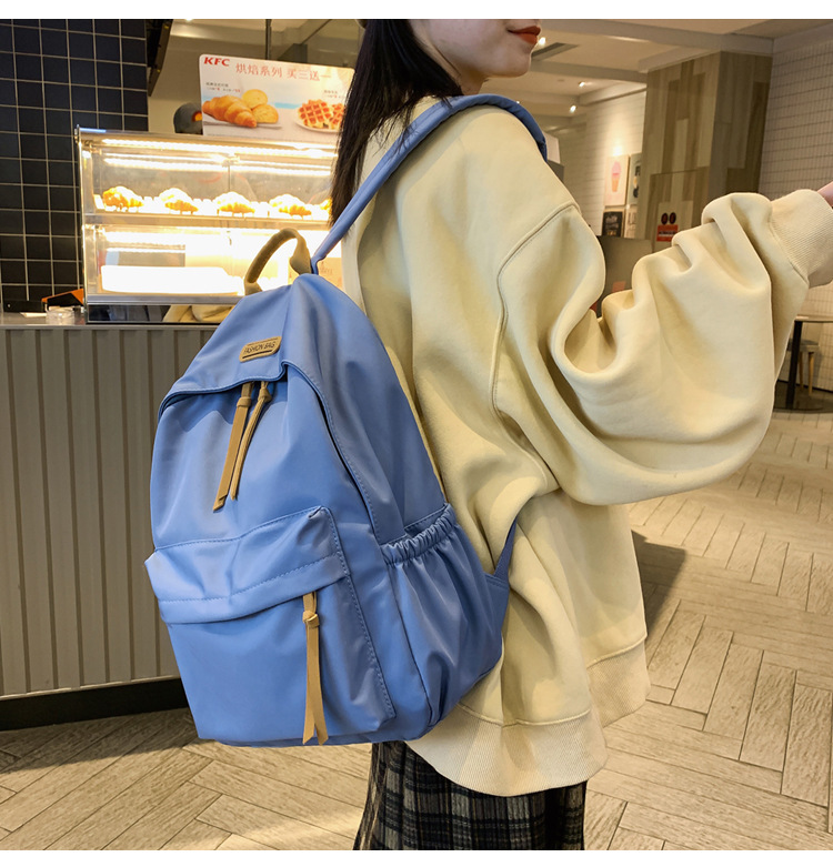 Two-shoulder-packed Japanese-Hong Kong, 2021 new clean, colour-coloured junior high school students' school bags are about a large volume backpack.