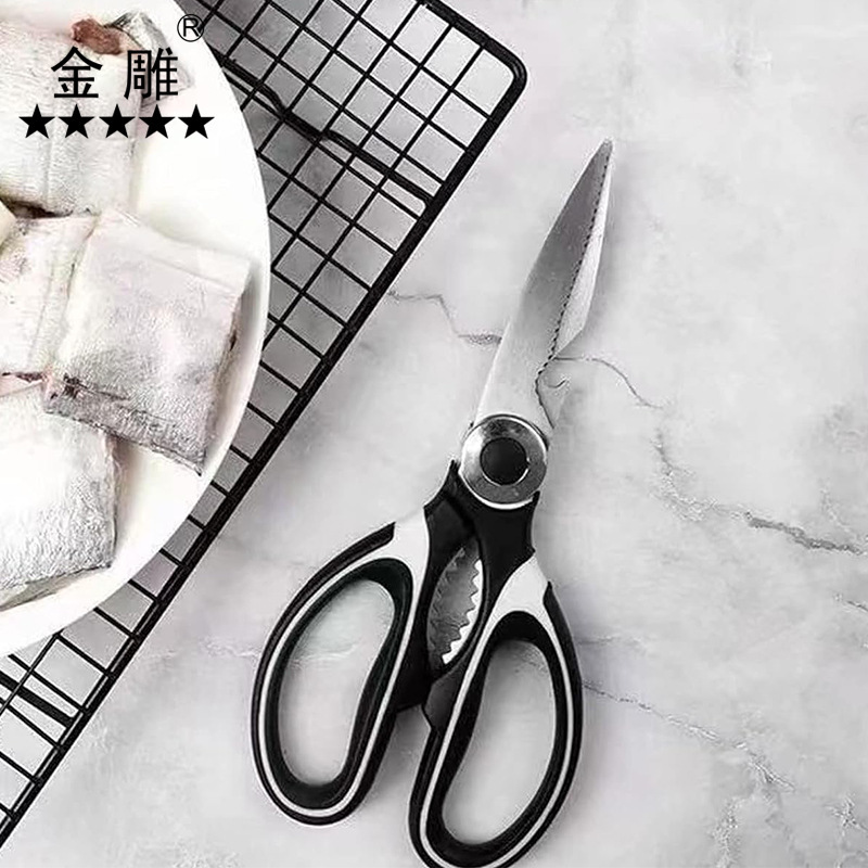 A multi-purpose kitchen-scissor stainless steel.