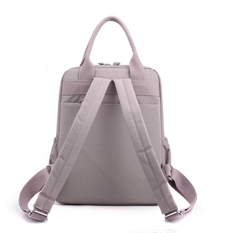 Cross-border thermal sale of double-shouldered, high-capacity student packs, squirming nylon buns, handbags.