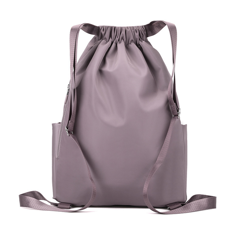 The new double-shoulder-packed leisure lady travel bag with light waterproof nylon packs of students' bags.