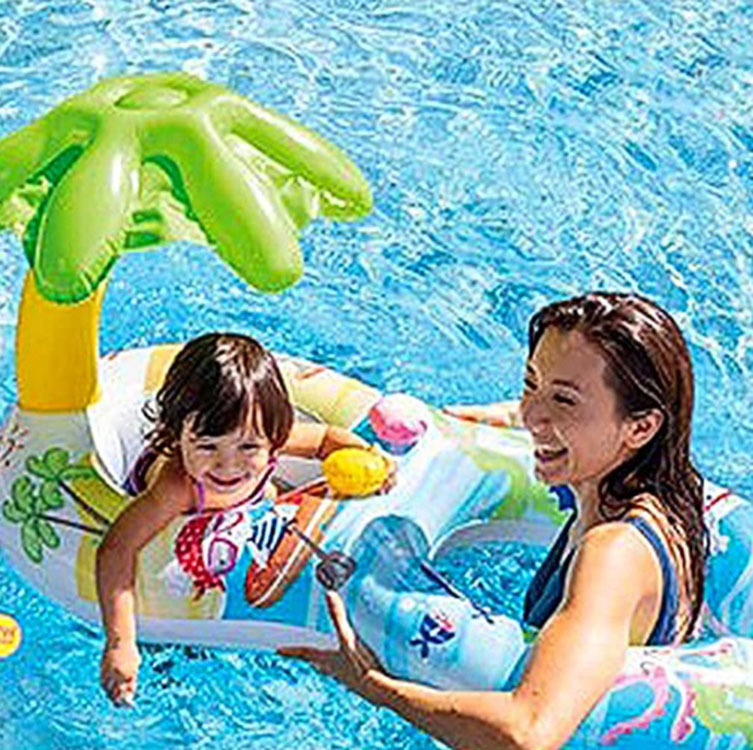 The new Amazon diver baby-sitting baby-sitting children swimming in their own swimming ring.