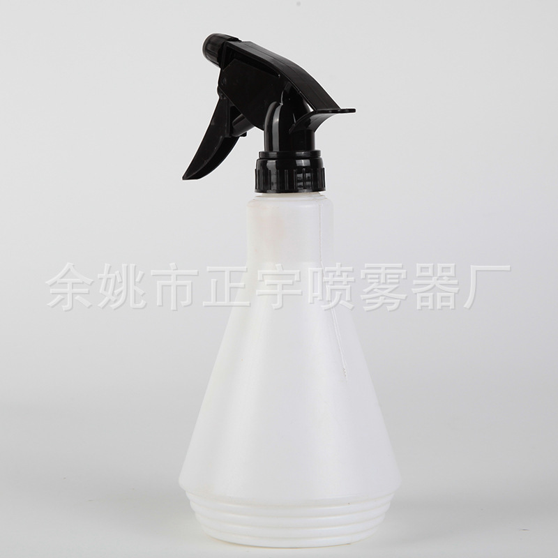 Một máy phun sương 300ml, một cái chậu vườn với một cái bình phun nước, một cái nút phun nước bằng tay.