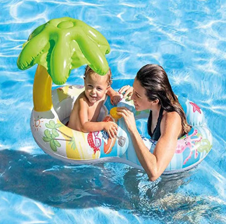 The new Amazon diver baby-sitting baby-sitting children swimming in their own swimming ring.