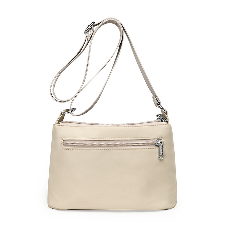 2024 JLS new size, single-shoulder-backed twirling lady, lightweight waterproof nylon bag.