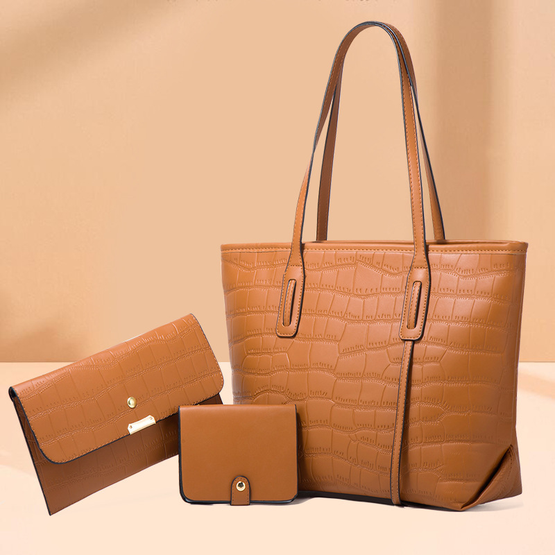 New style stone-grained large tote handbags with a girl's bag short about three packs of mother-packs.