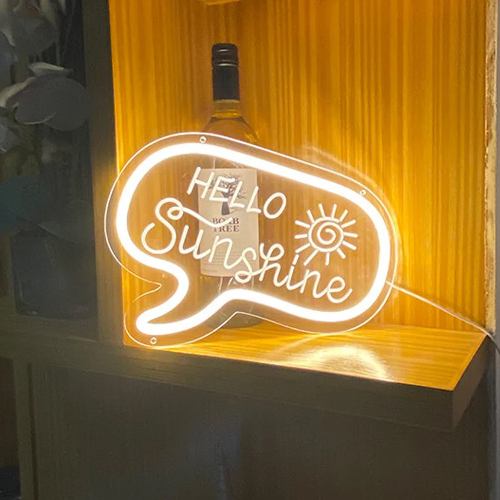Chữ Anh neon, xin chào ánh nắng mặt trời, các bạn đã vượt qua biên giới với một nhãn hiệu ánh sáng lấp lánh.