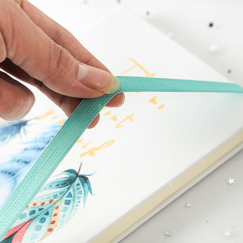 A5 Creative personal feather cover notebook with thick, fine office supplies.