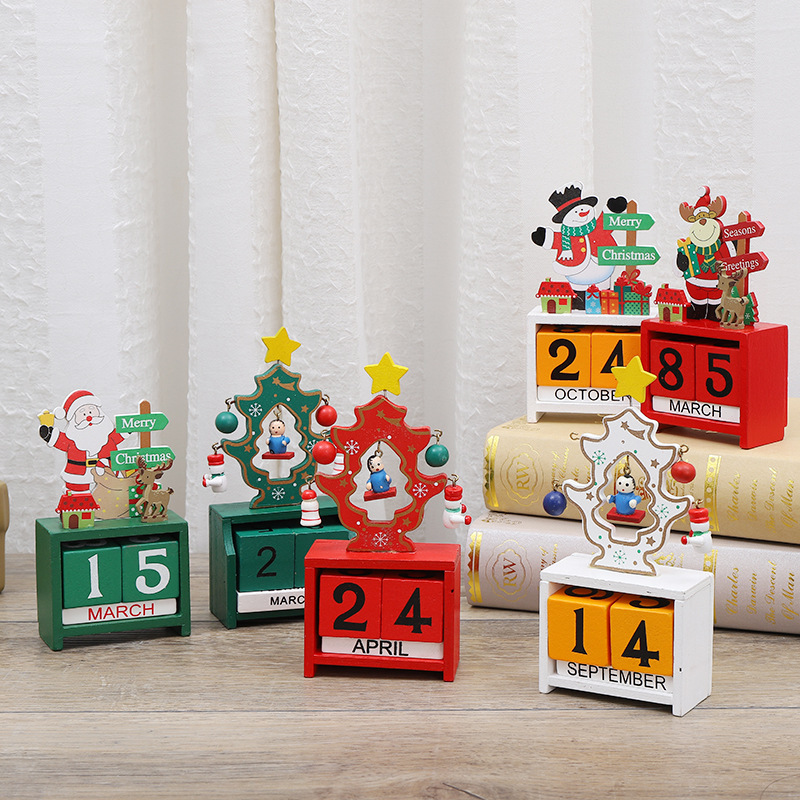 A Christmas tree with a digital calendar, an creative wood office table with children's Christmas presents