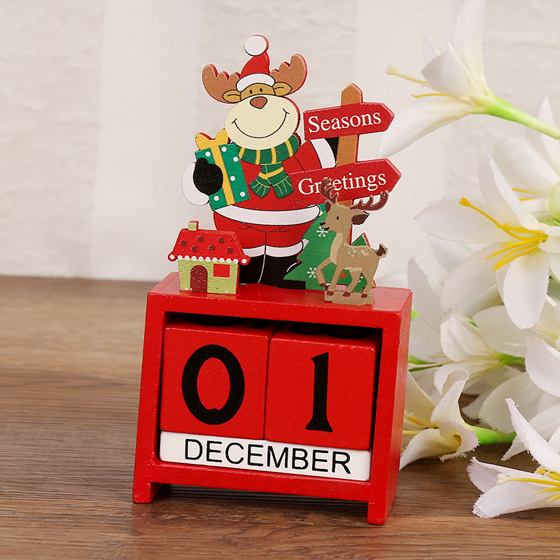 A Christmas tree with a digital calendar, an creative wood office table with children's Christmas presents