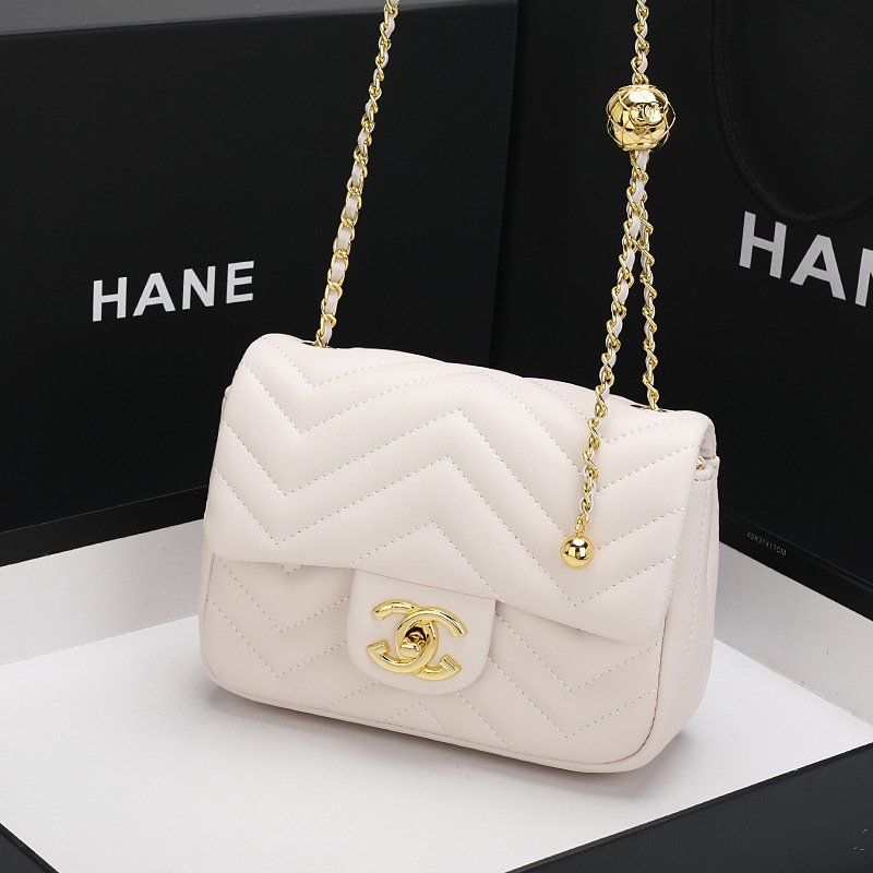 2023 new twirling gold ball bag by fat one-shoulder, little vanilla chain bag.