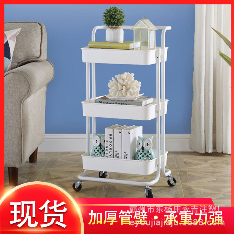 Một nhà bếp đa tầng với xe đẩy tự điều khiển có thể di chuyển đồ tiếp tế để đón những chiếc xe đẩy nhỏ.