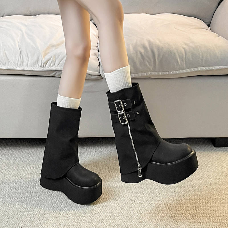 Big-haired boots, sweet, hot-fried chicks with big boots on their bottoms, but no knee-sized boots.