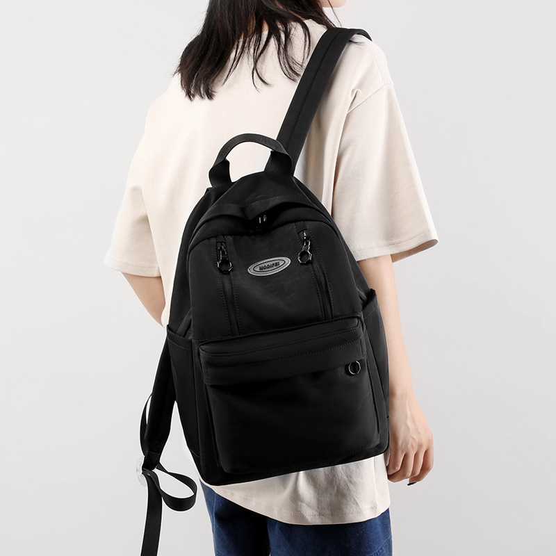 Two-shoulder-packed, 2023 new Korean-size, pure-coloured travel pack for women with high-capacity high school college.