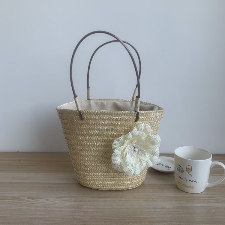 The factory supplies one-shoulder summer braids, knitting handbags, one-shoulder weeds on the beach.