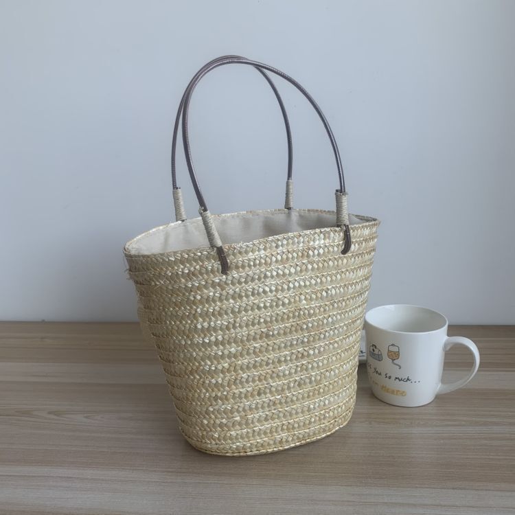 The factory supplies one-shoulder summer braids, knitting handbags, one-shoulder weeds on the beach.