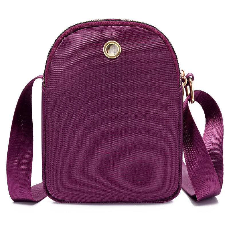Summer nylon key cell phone bag with girl slant across the canvas.