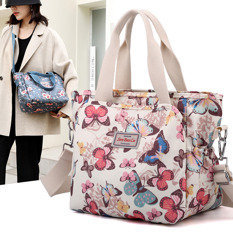 Ladies' printing packs with a large capacity of 2023 new one-shoulder slashy-slip bag of commuting buckets