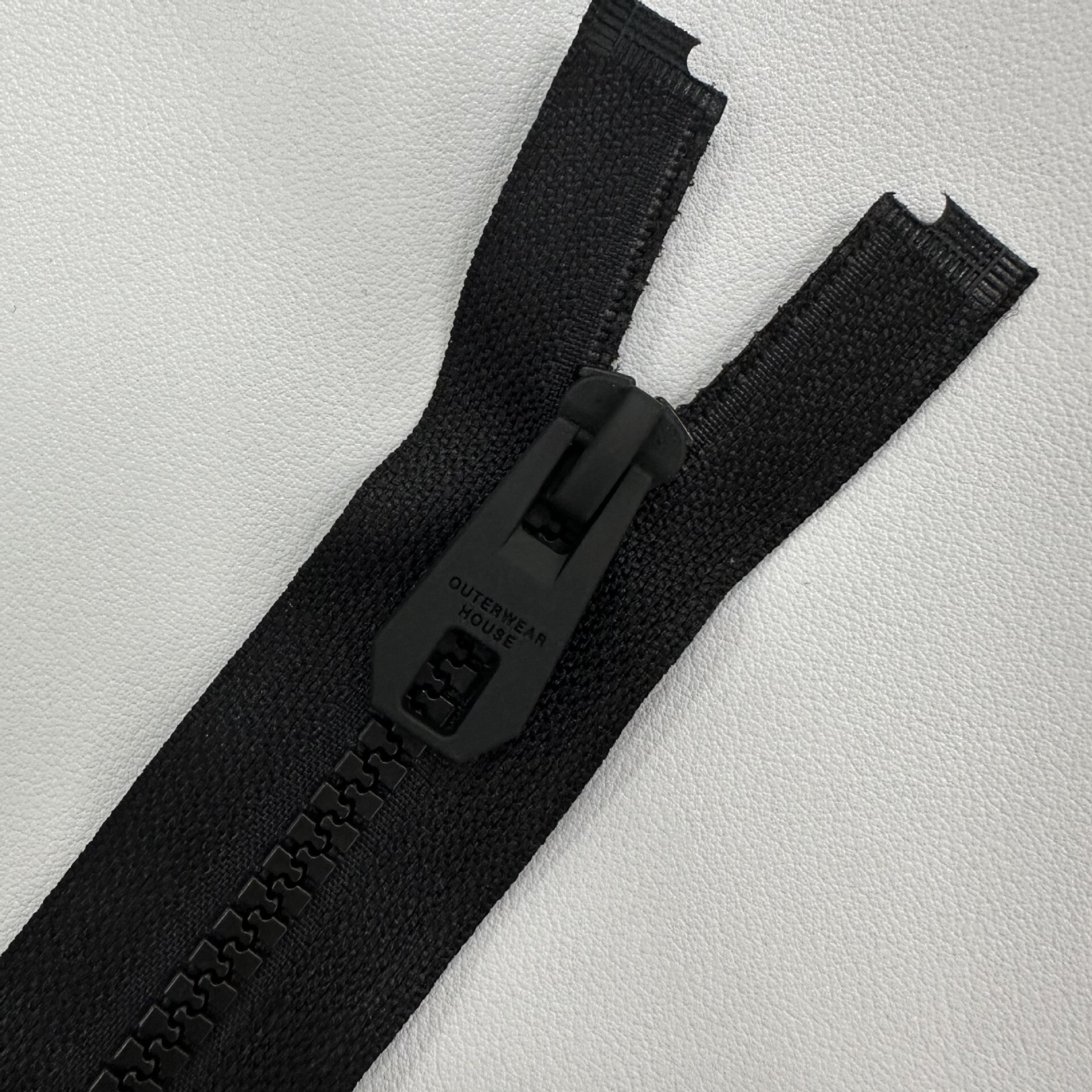 The factory sells black resin number 5 for the stow-laced school uniform.